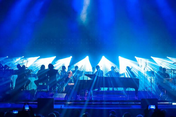 Kharkiv, Ukraine - May 21, 2019: Svyatoslav Vakarchuk with orchestra