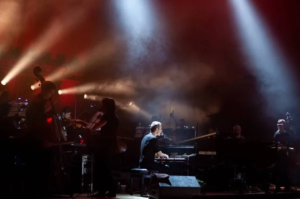 Kharkiv, Ukraine - May 21, 2019: Svyatoslav Vakarchuk with orchestra Royalty Free Stock Photos