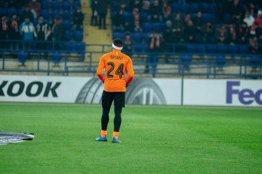 Kharkiv, Ukraine - February 20, 2020: Forward of Shakhtar Donetsk Taison in t-shirt with numbers Bryant during match vs Benfica. Film noise on photo