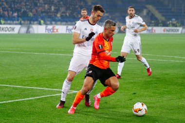Kharkiv, Ukraine - February 20, 2020: Marlos and Ferro celebrate goal in match Europa League Shakhtar - Benfica