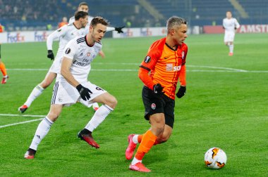 Kharkiv, Ukraine - February 20, 2020: Marlos and Ferro celebrate goal in match Europa League Shakhtar - Benfica
