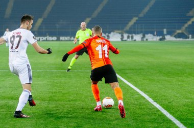 Kharkiv, Ukraine - February 20, 2020: Marlos and Ferro celebrate goal in match Europa League Shakhtar - Benfica