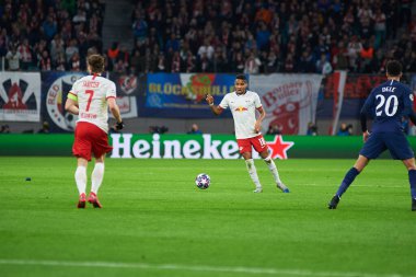 Leipzig, Almanya - 10 Mart 2020: Leipzig-Tottenham maçında Christopher Nkunku, Sabizer, Dele Alli