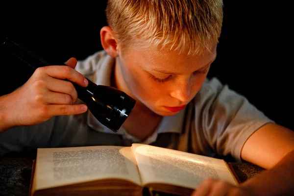 Boy reading a book — Stock Photo, Image