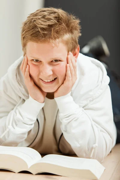 Schoolboy doing his homework — Stock Photo, Image