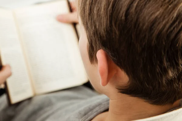 Boy reading a book — Stock Photo, Image