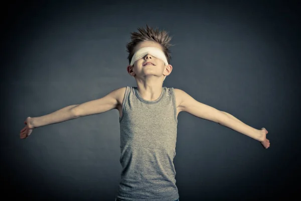 Young Boy with Wide Open Arms and Covered Eyes — Stock Photo, Image