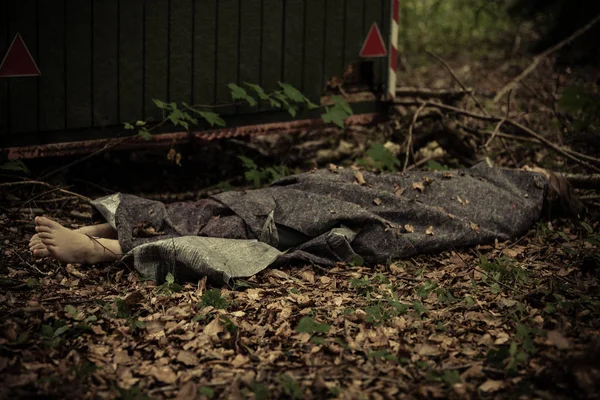 Wrapped up dead body of young person — Stock Photo, Image