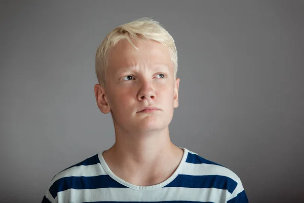 Front view on boy with concerned expression — Stock Photo, Image