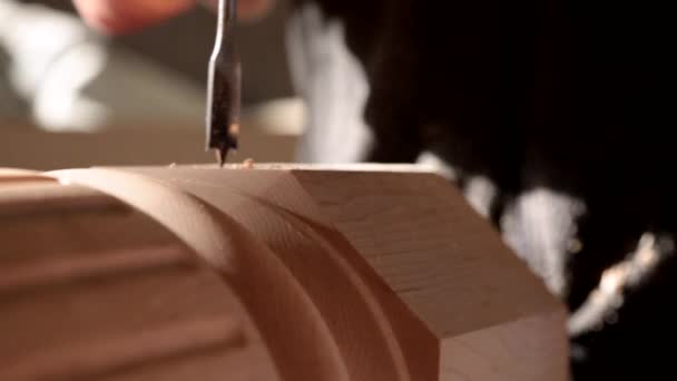 Worker drilling hole wooden piece — Stock Video