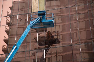 İnşaat işçisi vinç duvar arka plan