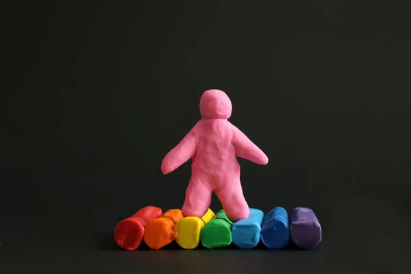 LGBT symbol rainbow pink plasticine figure — Stock Photo, Image