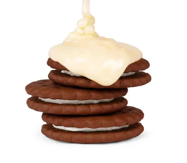 Cookie gecondenseerde melk gegoten op een witte achtergrond — Stockfoto