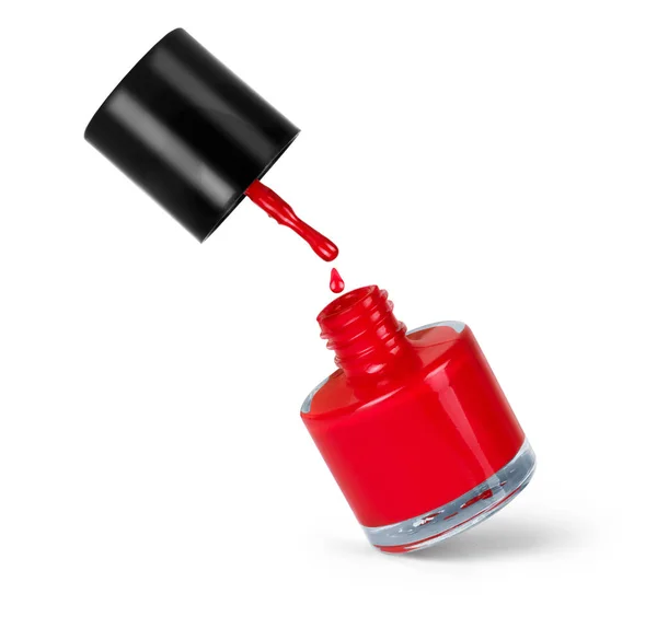 Bouteille de vernis à ongles rouge avec éclaboussure isolée sur blanc — Photo