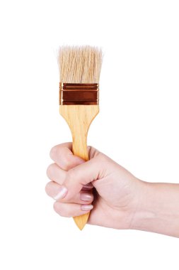 hand met borstel geïsoleerd op witte achtergrond