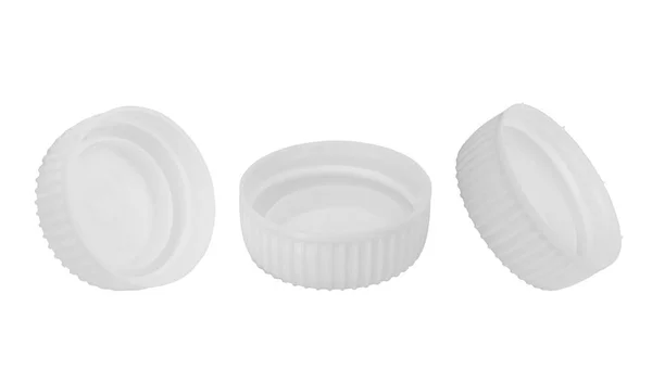 Three plastic bottle cap on a white background — Stock Photo, Image