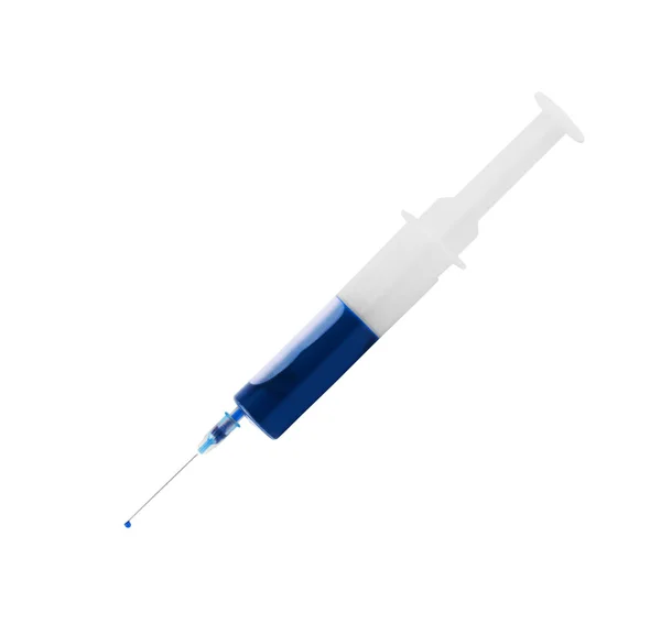 High angle view of syringe and stain against white background mi — Stock Photo, Image