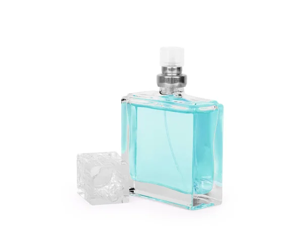 Vrouwen parfum in een mooie fles op een witte achtergrond — Stockfoto