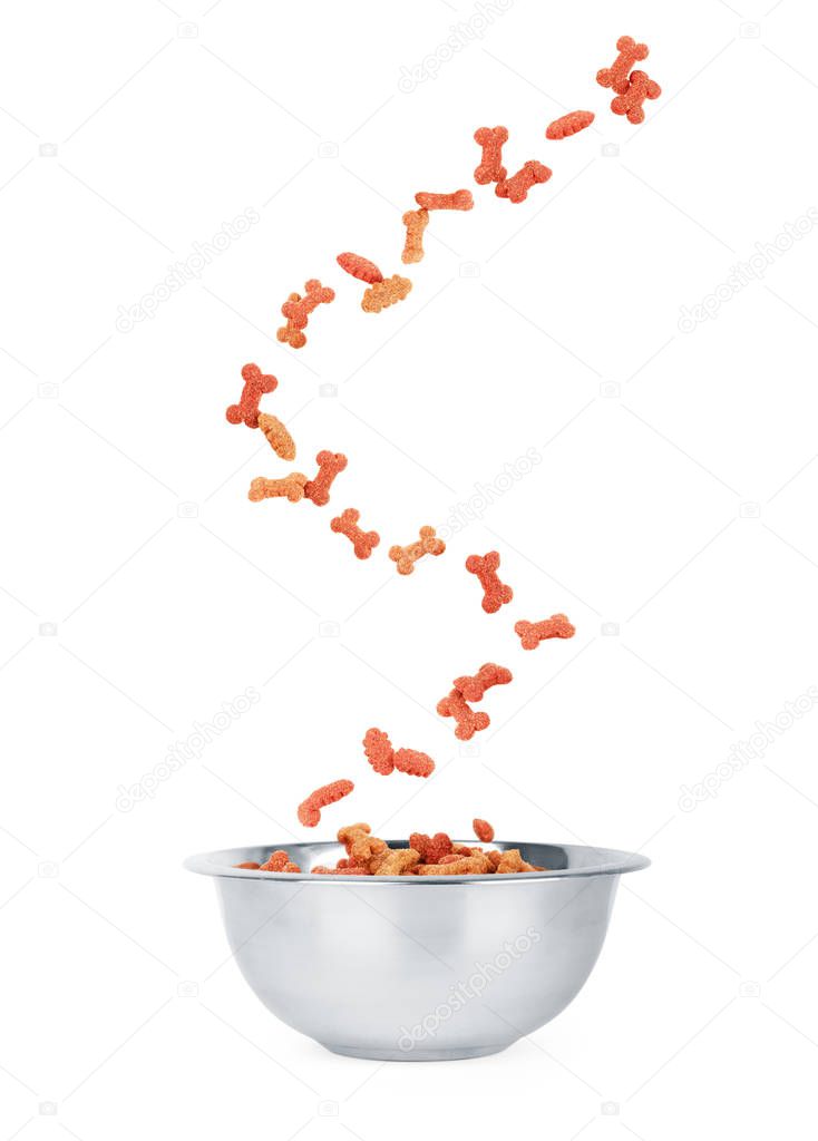 Pet food drops in a bowl on a white background
