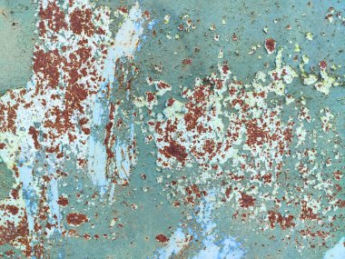 Aşınmış metal zemin. Paslı metal arka planda pas izleri var. Pas lekeleri. Rystycorrosion.