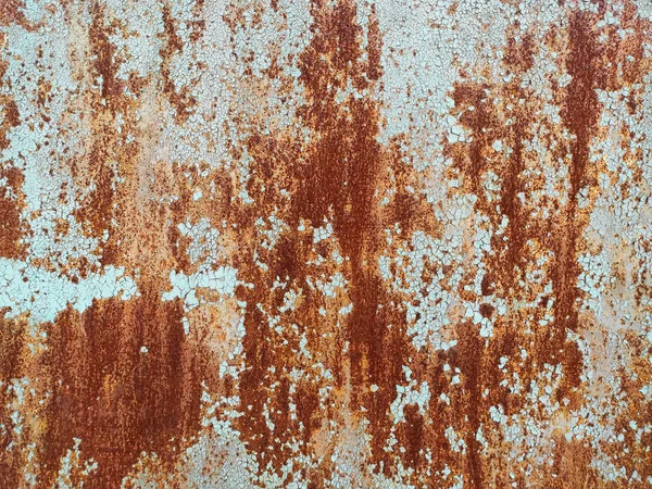 腐食した金属の背景。錆の縞が付いている錆びた金属の背景。汚れを落とせ。流行腐食. — ストック写真