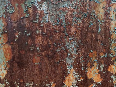 Aşınmış metal zemin. Paslı metal arka planda pas izleri var. Pas lekeleri. Rystycorrosion.