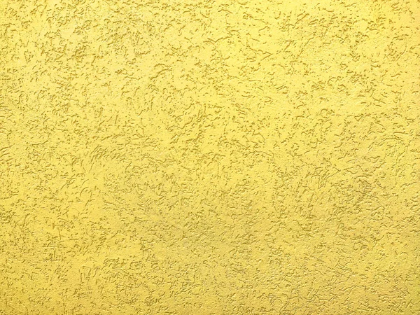 The texture of the plaster is bark beetle on the wall. Seamless yellow texture. — Stock Image Texture Plaster Bark Beetle Wall Seamless Yellow Texture Stock Picture