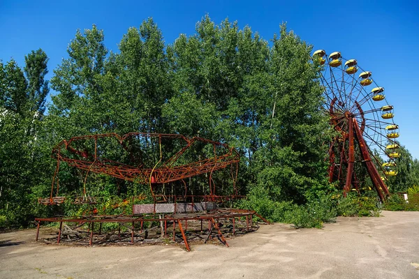 Abandoned attractions in unusement park in ghost town Pripyat, Chernobyl Exclusion Zone, nuclear meltdown catastrophe