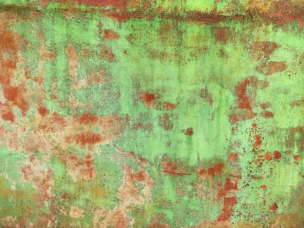 Corroded metal background. Rusted white painted metal wall. Rusty metal background with streaks of rust. Rust stains. The metal surface rusted spots. Rystycorrosion.