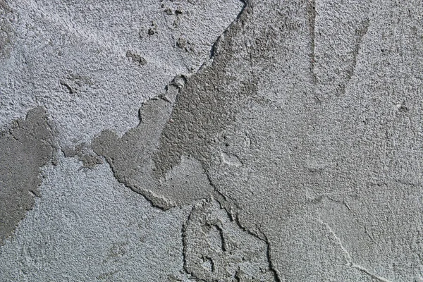 Stone plaster wall background and texture style. Smears on a concrete wall. — Stock Photo, Image