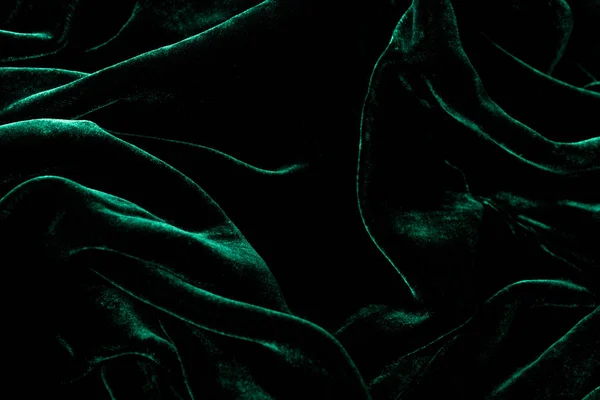 Темно-зелений оксамитовий фон. Розкішний блискучий матеріал . — стокове фото