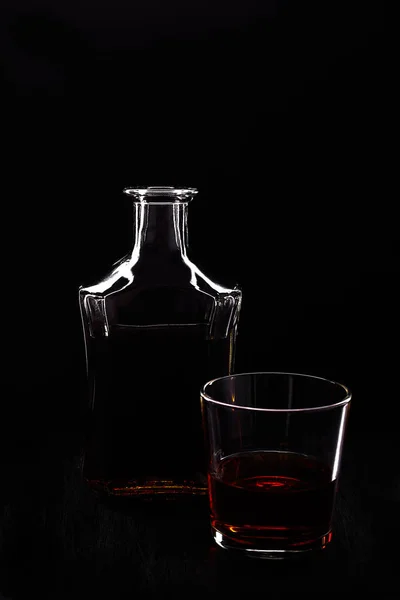 Glass of whiskey with bottle. — Stock Photo, Image