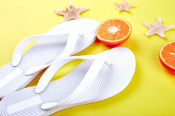 Summer Concept White Flip Flops Orange Fruit Starfish Yellow Paper — Stock Photo, Image