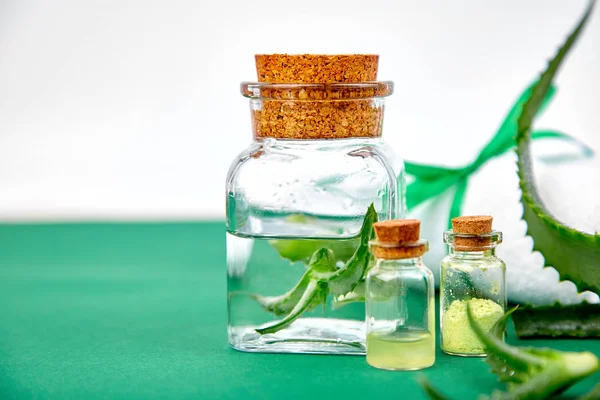 Aloe Vera Oil Glass Bottle Towel Spa Green Background Star — Stock Photo, Image