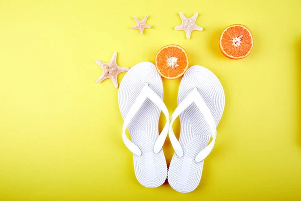 Summer Concept White Flip Flops Orange Fruit Starfish Yellow Paper — Stock Photo, Image