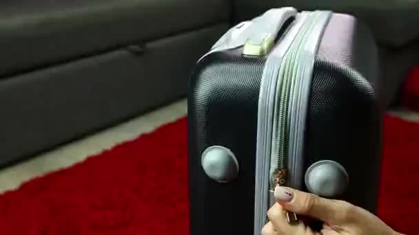 Close up of a suitcase zipper being opened and closed by female hand. — Stock Video
