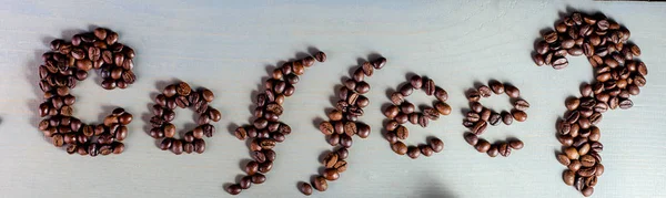 Banner of Coffee Inscription. Word Coffee on The Table near Cup.