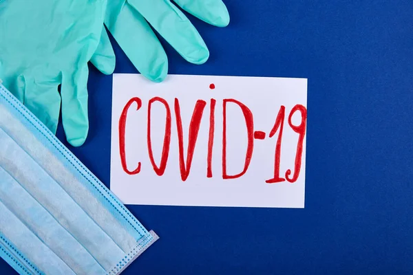 Coronavirus Cümle Metni Mavi Arka Planda Yatıyordu Eldivenler Mavi Arka — Stok fotoğraf
