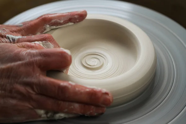Hands of a potter, creating white porcelain — 스톡 사진