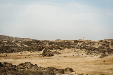 View of Namibia desert with transmission towers near South Africa