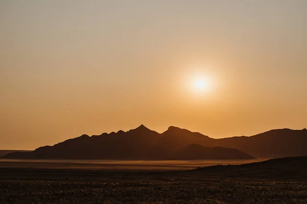 Por do sol em NamibRand Naturreservat na Namíbia, África — Fotografia de Stock