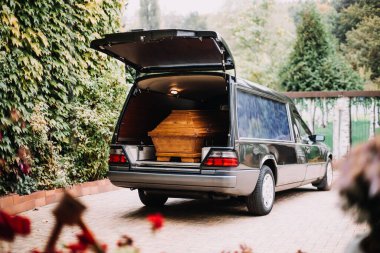 photo of a coffin in the back of car clipart