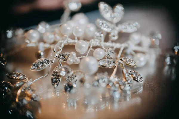photo of a brides hair accessory on a table