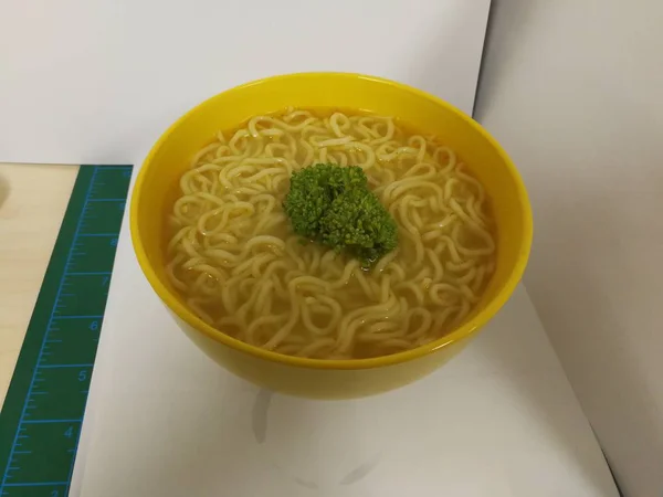 Instant Noodles with Vegetables, Green Chili, Carrots, Broccoli and Lime in Bowl