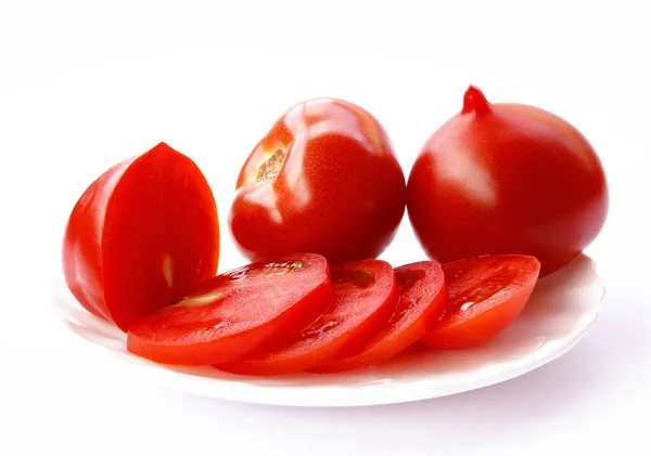 Tomates sobre fundo branco — Fotografia de Stock