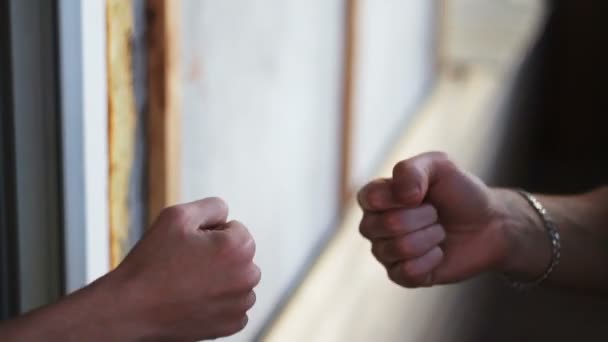 Rock paper scissors being played by two men high definition video — Stock Video