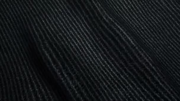 Dunkle, hochwertige Jeans-Textur, bewegliche Wellen, nahtlose Schlaufe — Stockvideo
