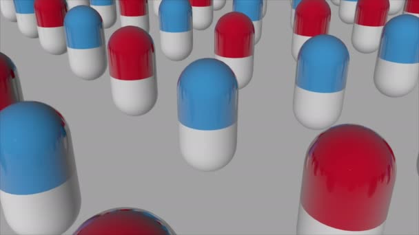 3D-Darstellung medizinischer Kapseln mit roter und blauer Farbe — Stockvideo