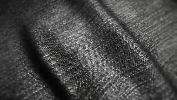 Realistische jeans zwaaiend in de wind. Abstracte achtergrond Ultra-HD resolutie. Close-up stof textuur. Naadloze lus — Stockvideo