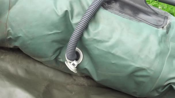 The boat PVC is pumped up by air by means of the electric pump — Stock Video